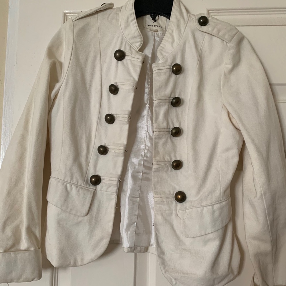 Buttoned up cream jacket